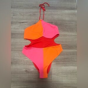 Brand new Parade bathing suit. Size xl, hygiene liner intact